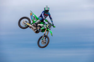 MaddParts.com Kawasaki rider Bubba Pauli in mid-air on his motorcycle.