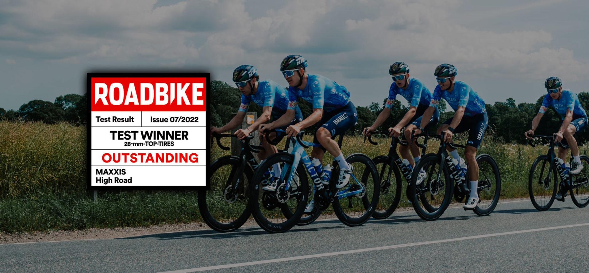 Background image of road cyclist with ROAD BIKE magazine award graphic