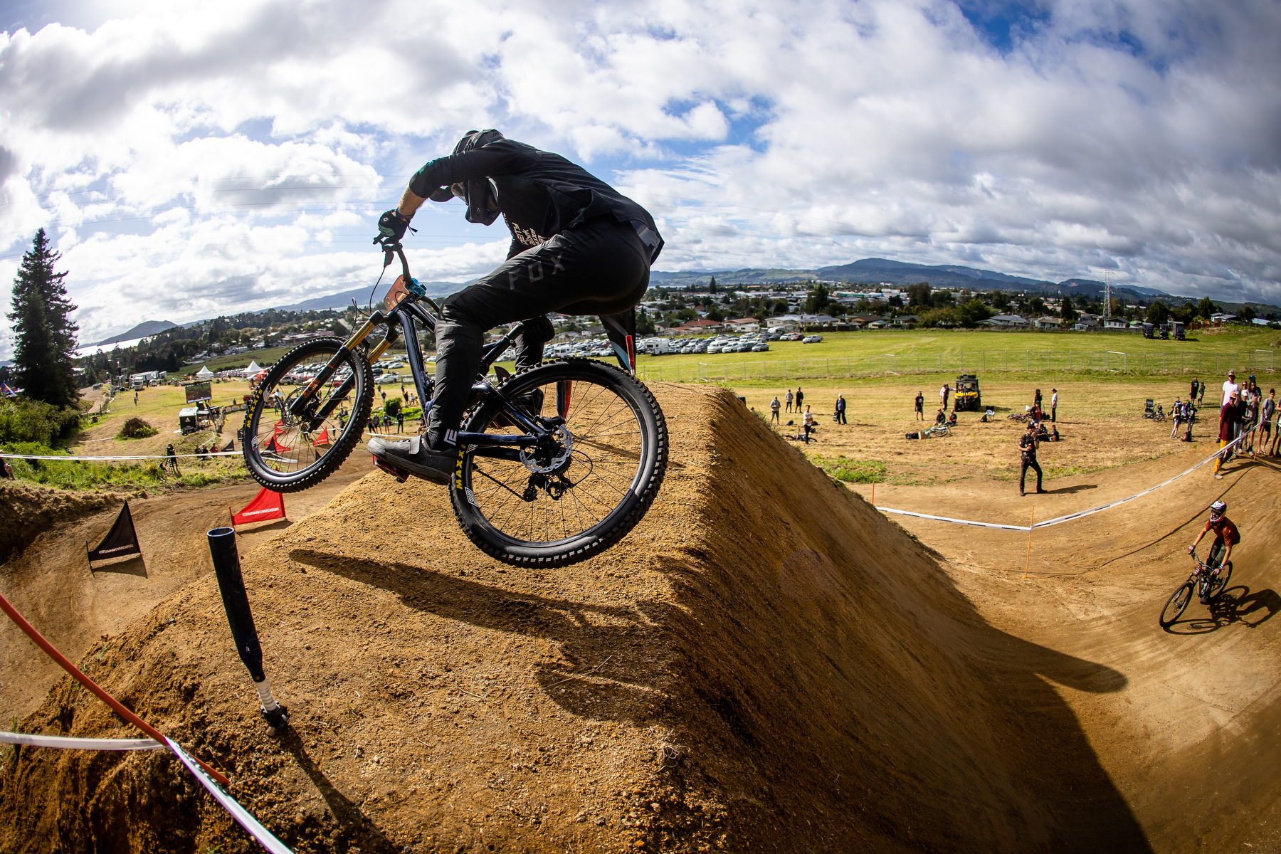 Rider scrubbing a jump