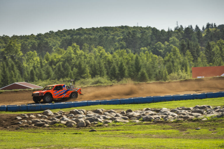 athlete throwing rooster tail at the race