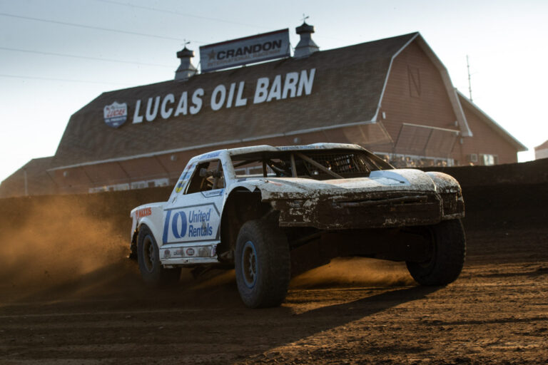 maxxis athlete in front of the crandon barn