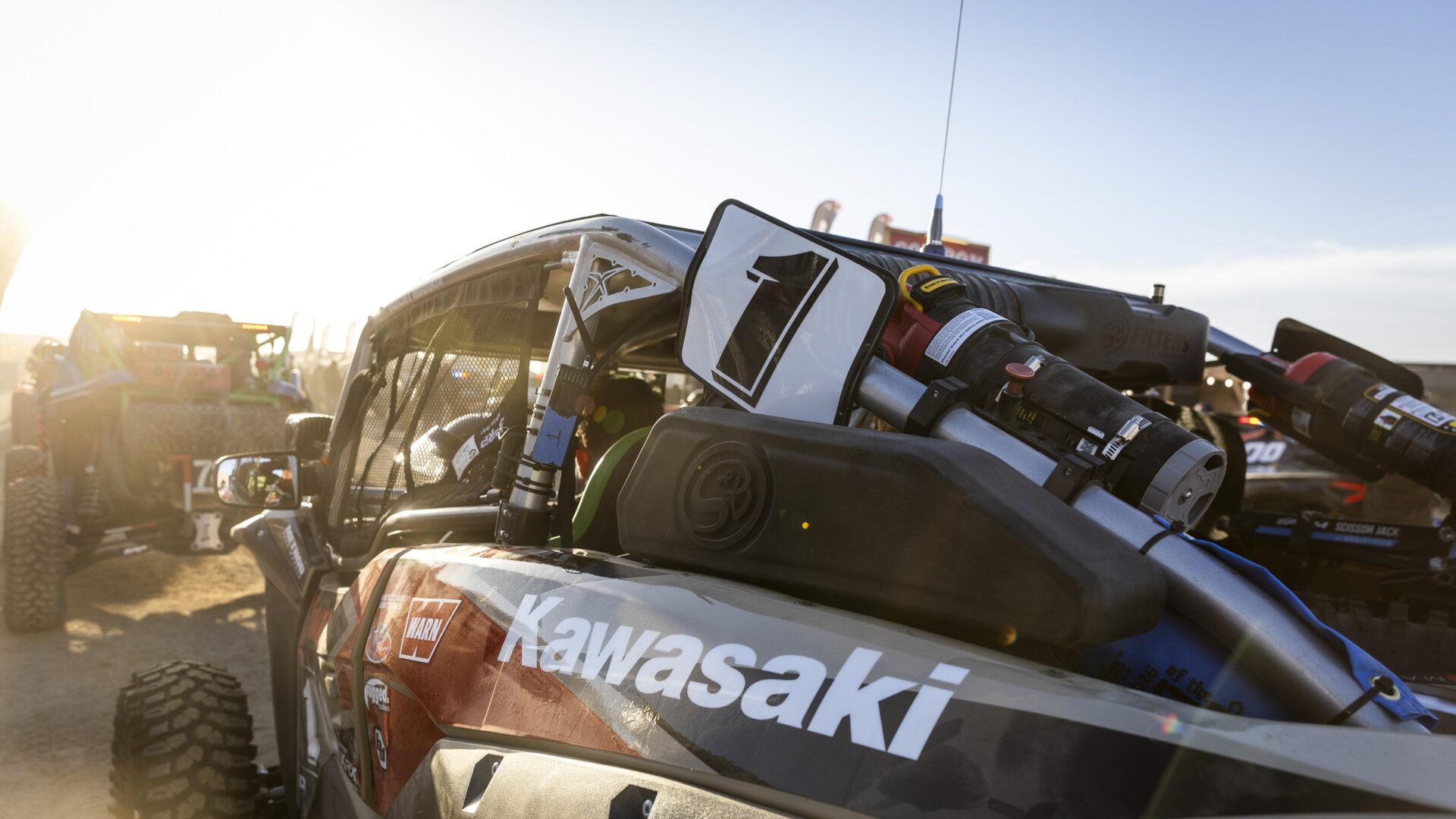 red and black Kawasaki with a bold number one on the side plate.