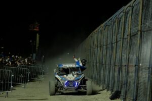 Bootle in the chute waving to the crowd