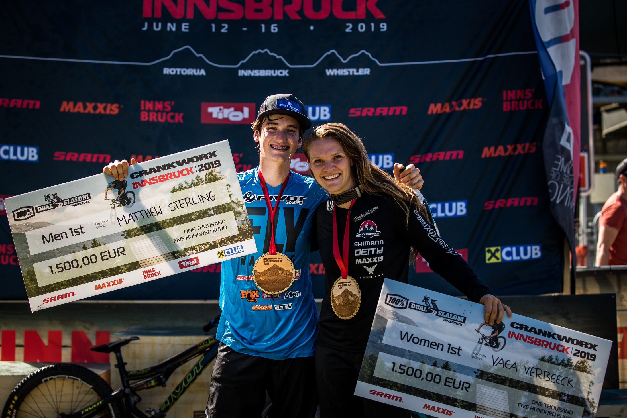 Matthew Sterling and Vaea Verbeeck show off their Dual Slalom hardware. Crankworx Innsbruck 2019.