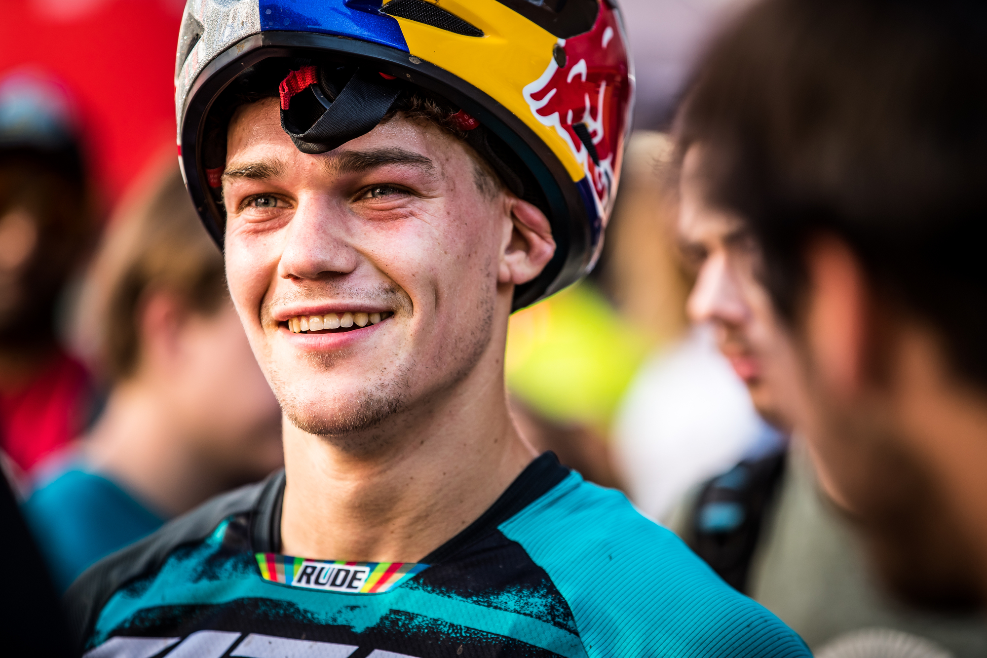 With his helmet half off, Richie Rude cracks a smile.