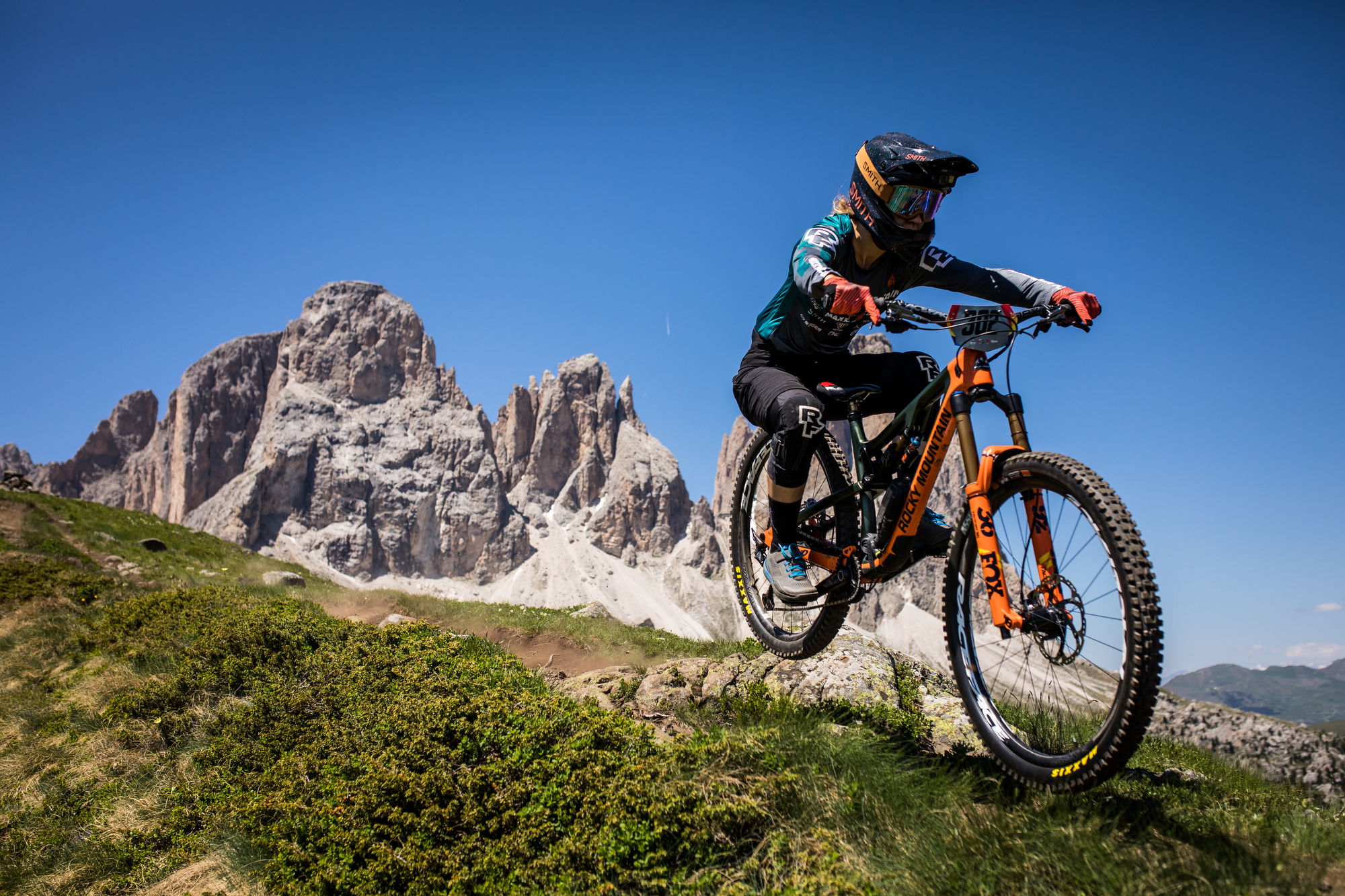 Andreane Lanthier Nadeau squashes a rock high up in the alpine landscape.
