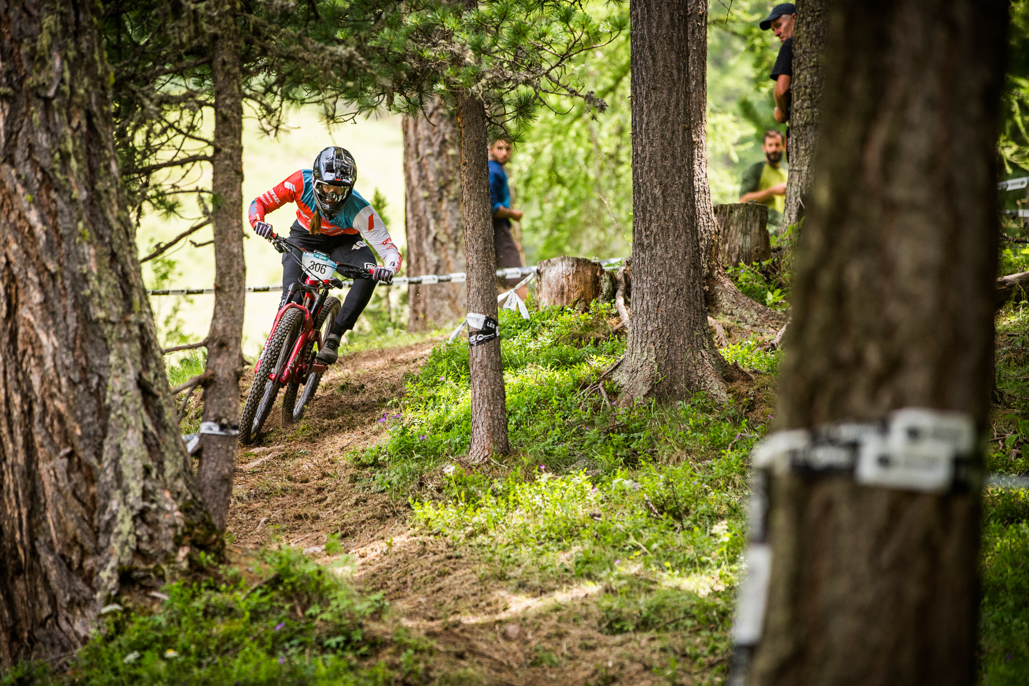 Miranda Miller keeps her feet on the pedals and cranking through the off-camber.