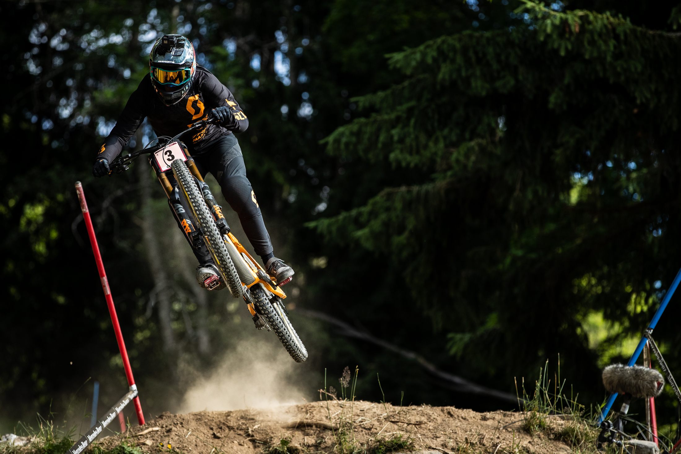 Marine Cabirou charges over a jump straight at the camera.