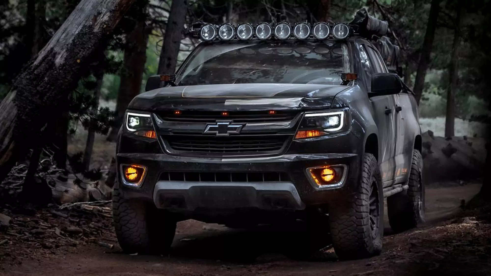 Chevy Z71 on a dirt trail with Maxxis RAZR AT tires.