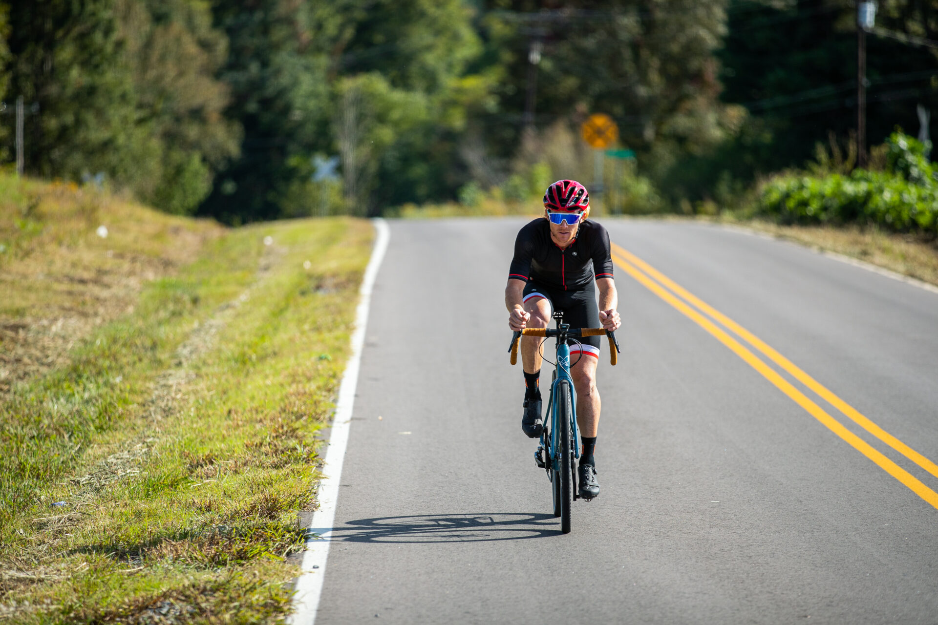 Road athlete riding down a lonely street