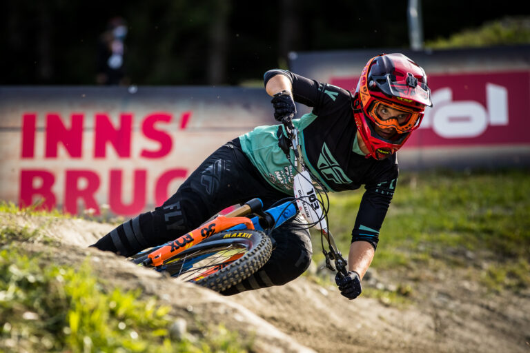 Rider hitting corner on Pivot