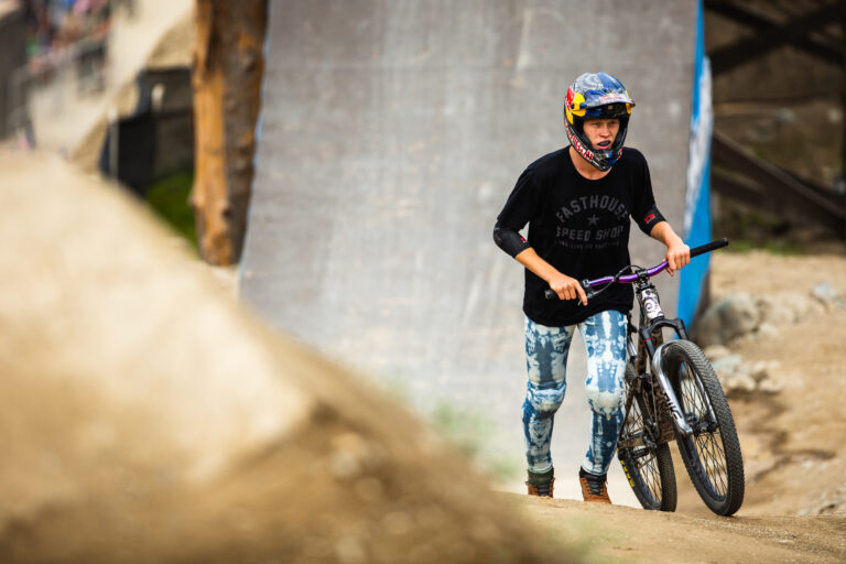 Emil walking his bike