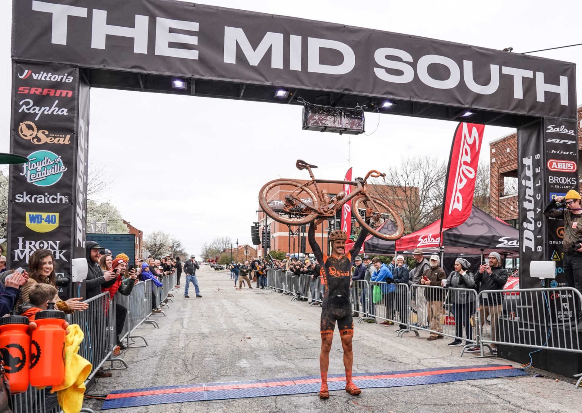 Rider raising bike at Mid South finish