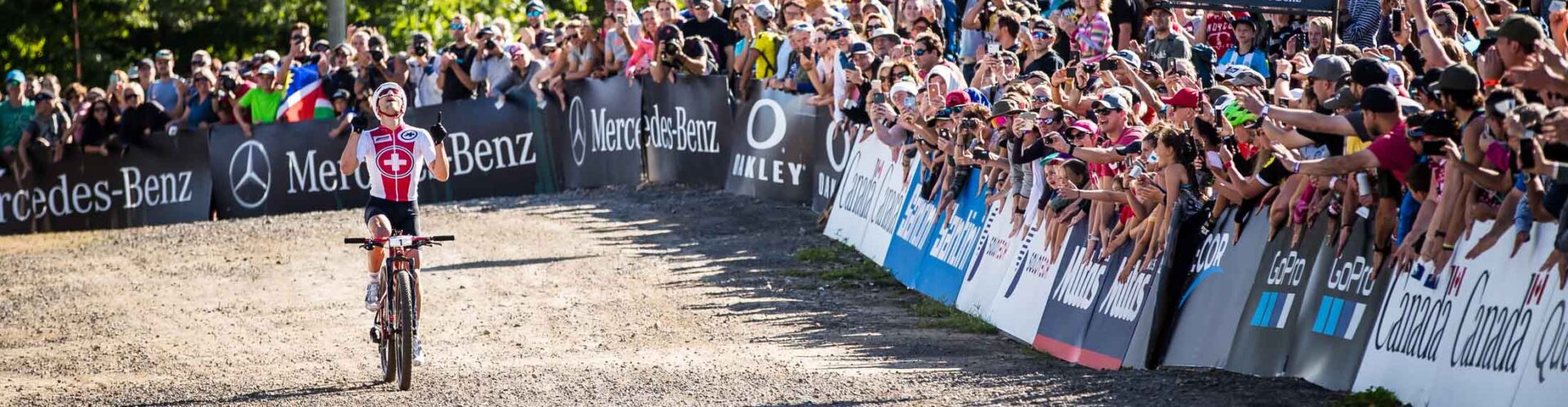 XC racer celebrating his finish