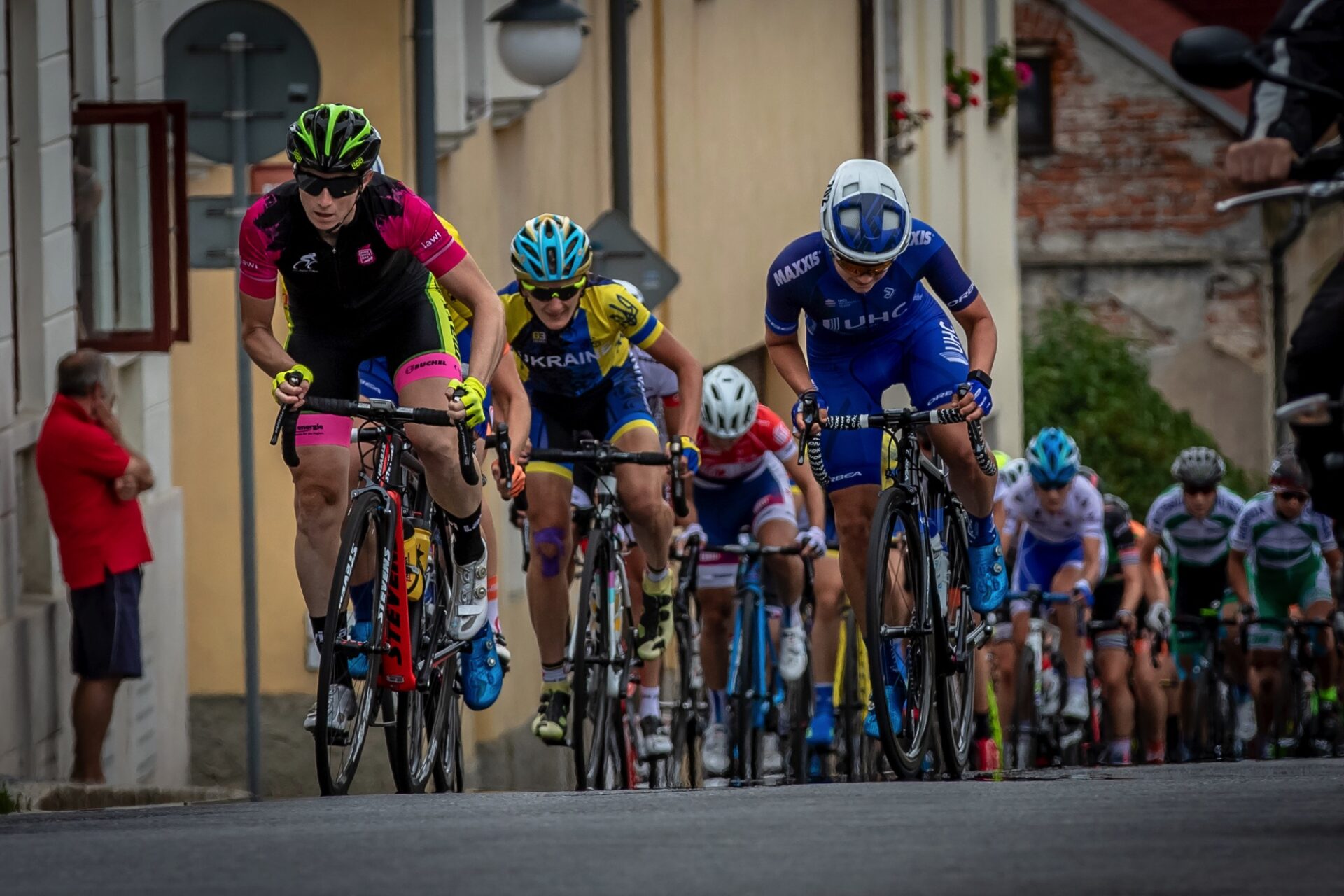 Road racers powering up a climb