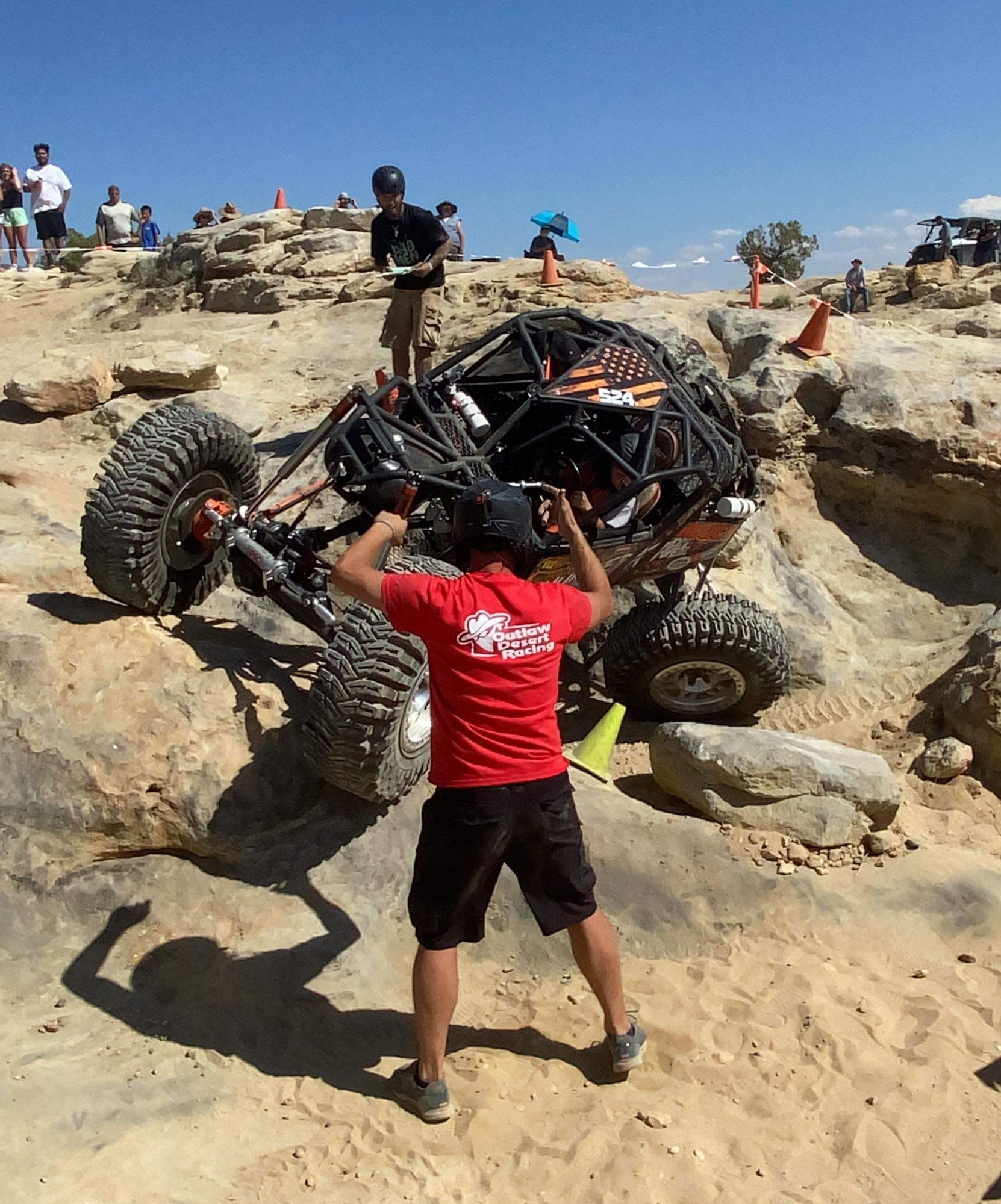 Landen Brown tackling a rock crawling obstacle