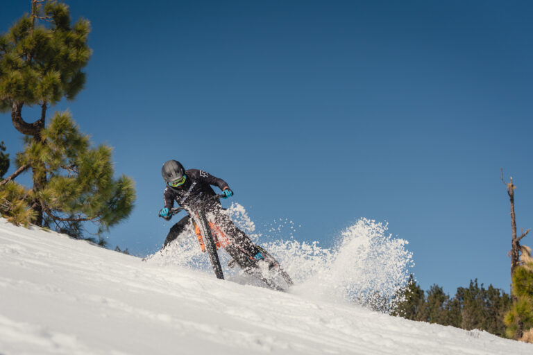 Rider drifting bike in the snow