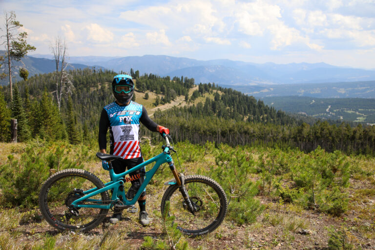 Yeti rider posing in the mountains with bike