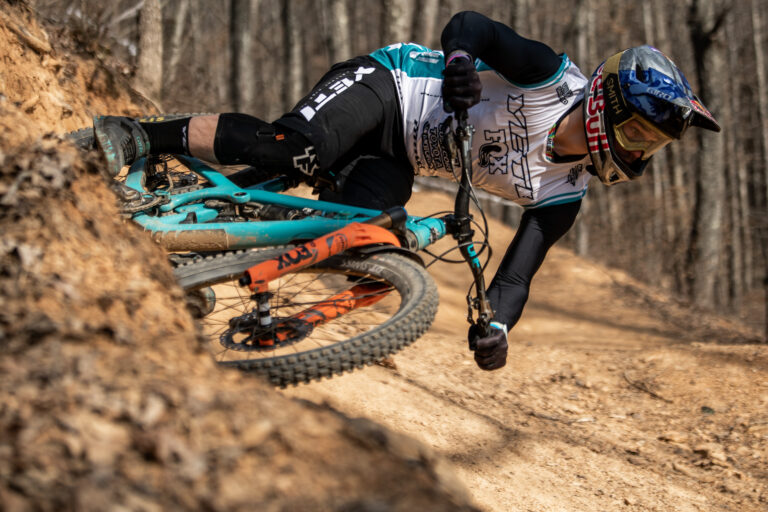 Richie smashing a berm