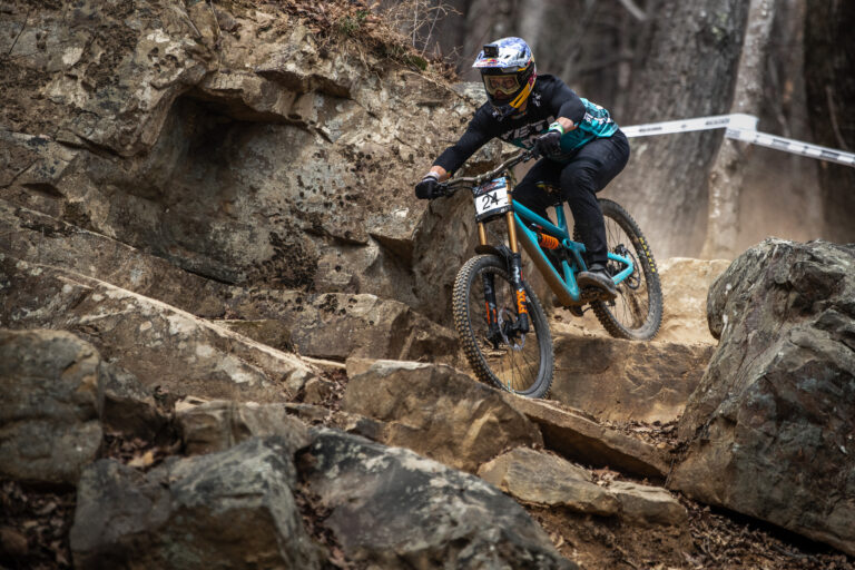 Richie riding down a rock garden