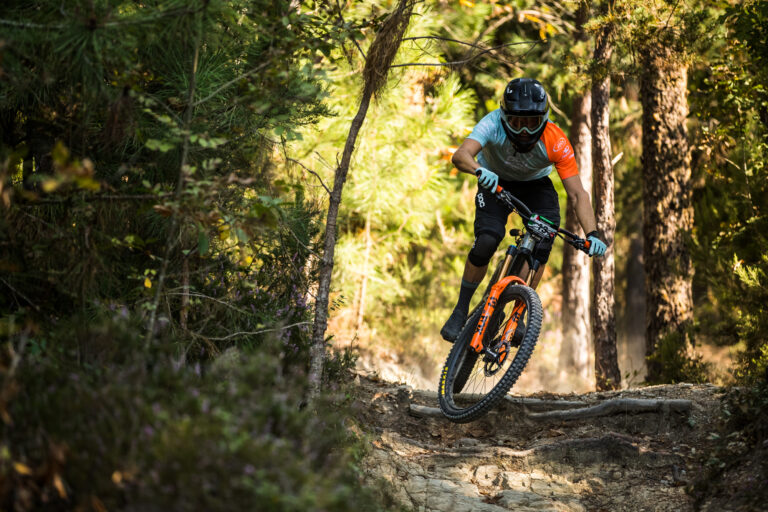 Ibis rider sending it down a rock garden