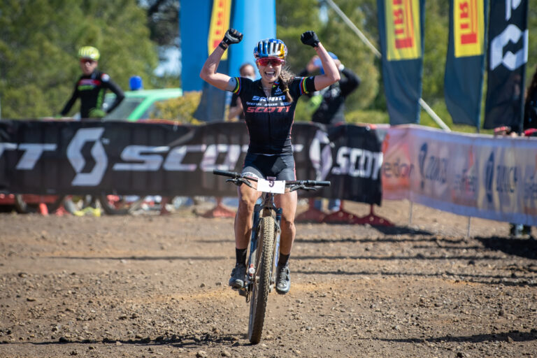 Courtney celebrating at the finish