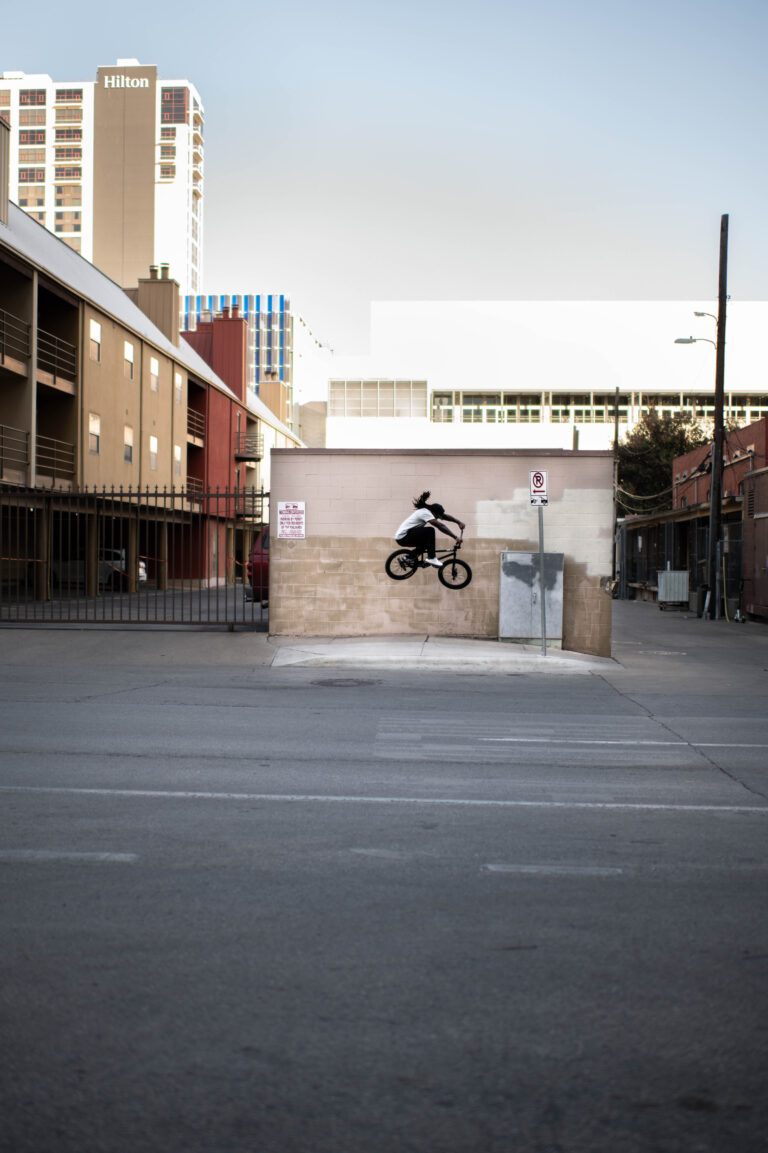 Simms jumping his BMX bike