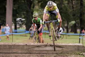 Kona CX racer jumping an obstacle