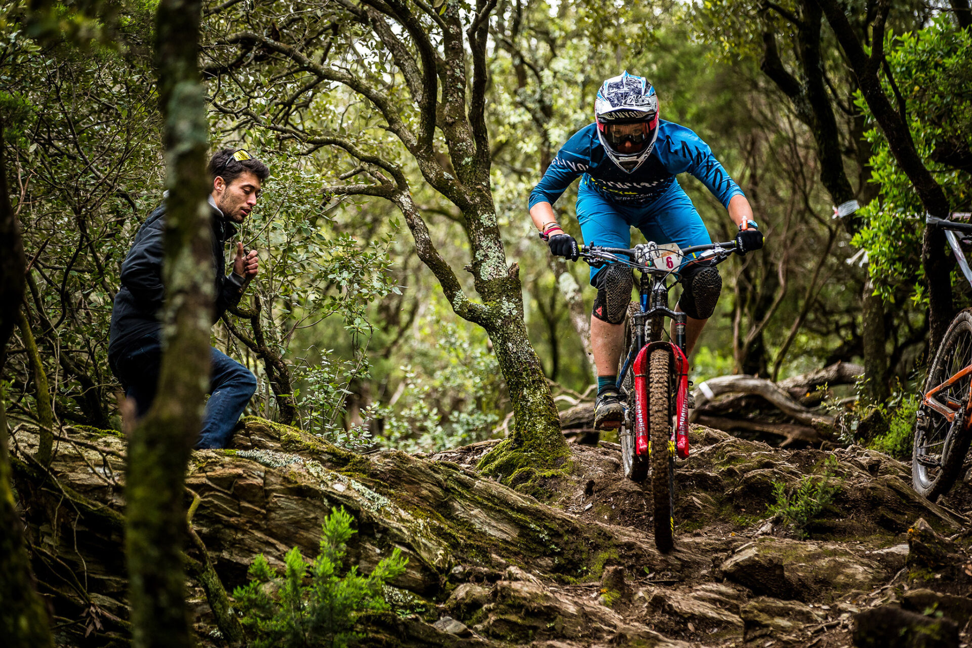 Canyon EWS racer sending it down rocks