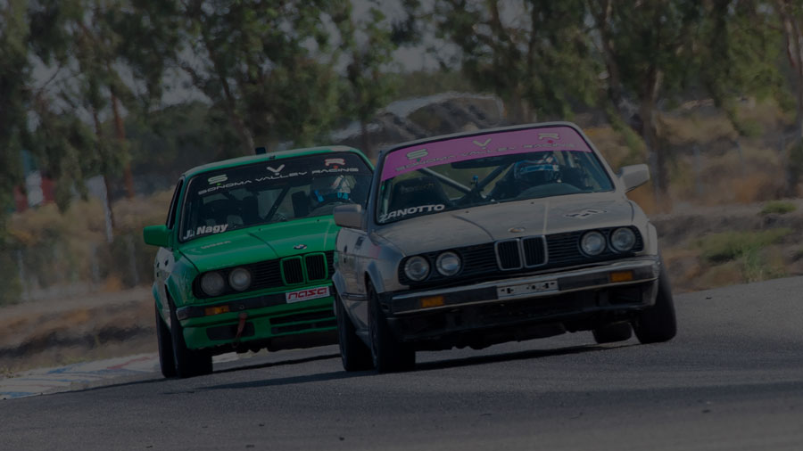 Two BMW cars racing