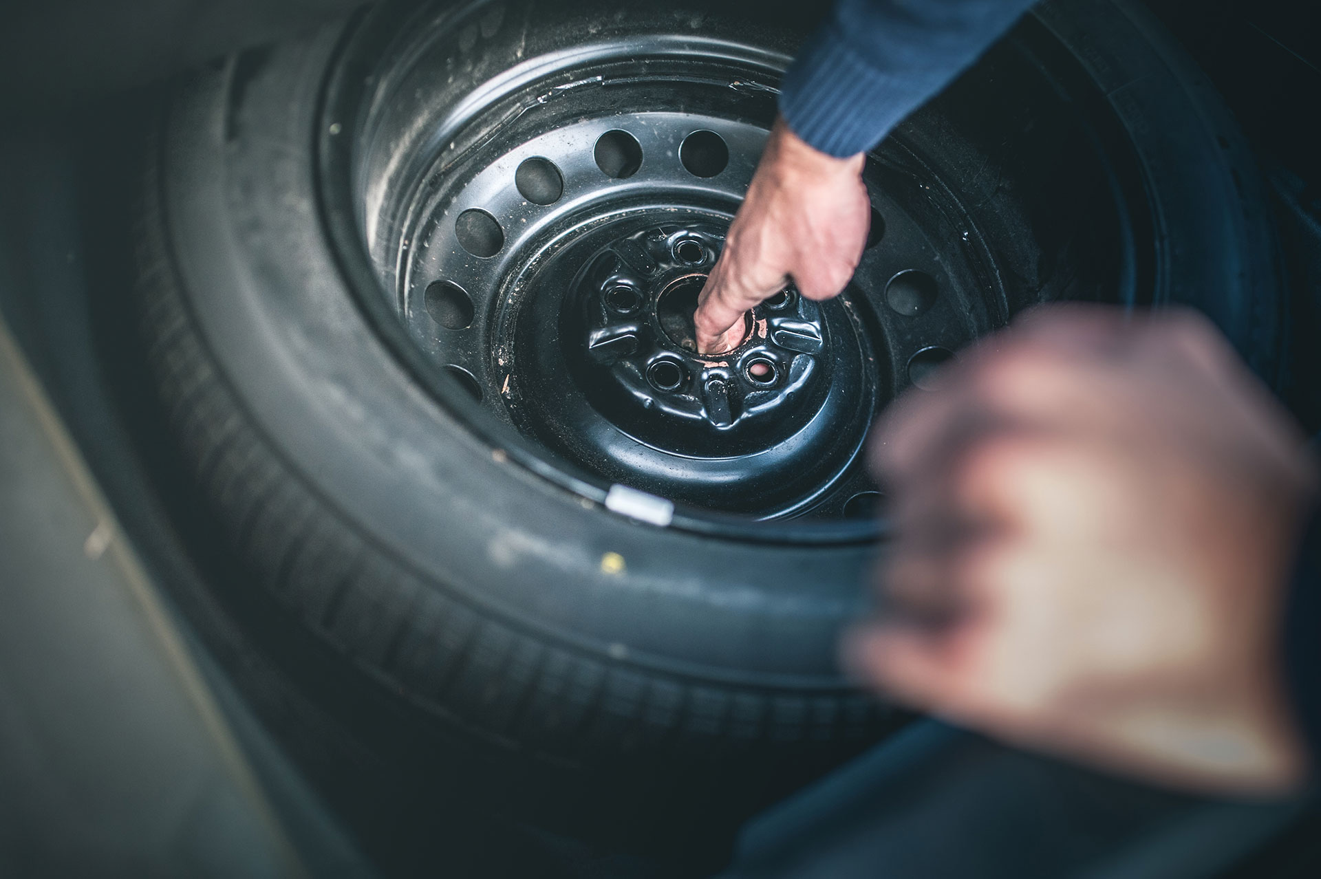 Spare tire in car trunk