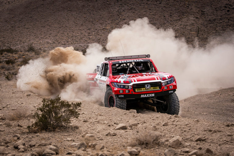 The Honda Offroad Racing Ridgeline blasting a turn on RAZR MTs.