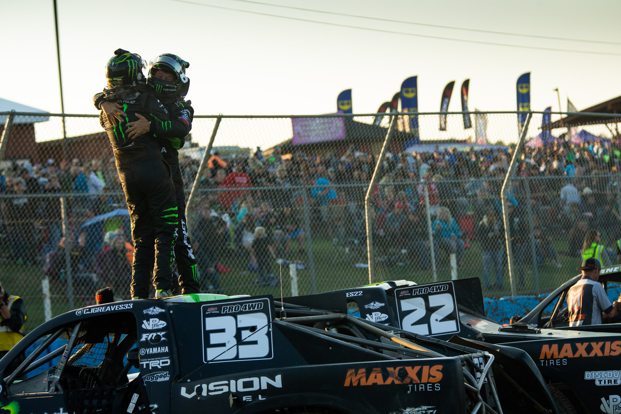 Father-son racers, Johnny and CJ Greaves celebrate after CJ's CHAMP racing series victory