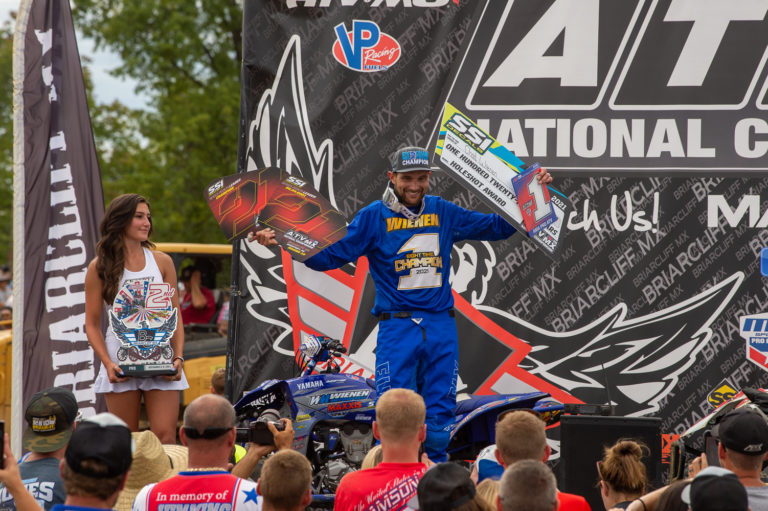 Chad Wienen celebrates on the podium