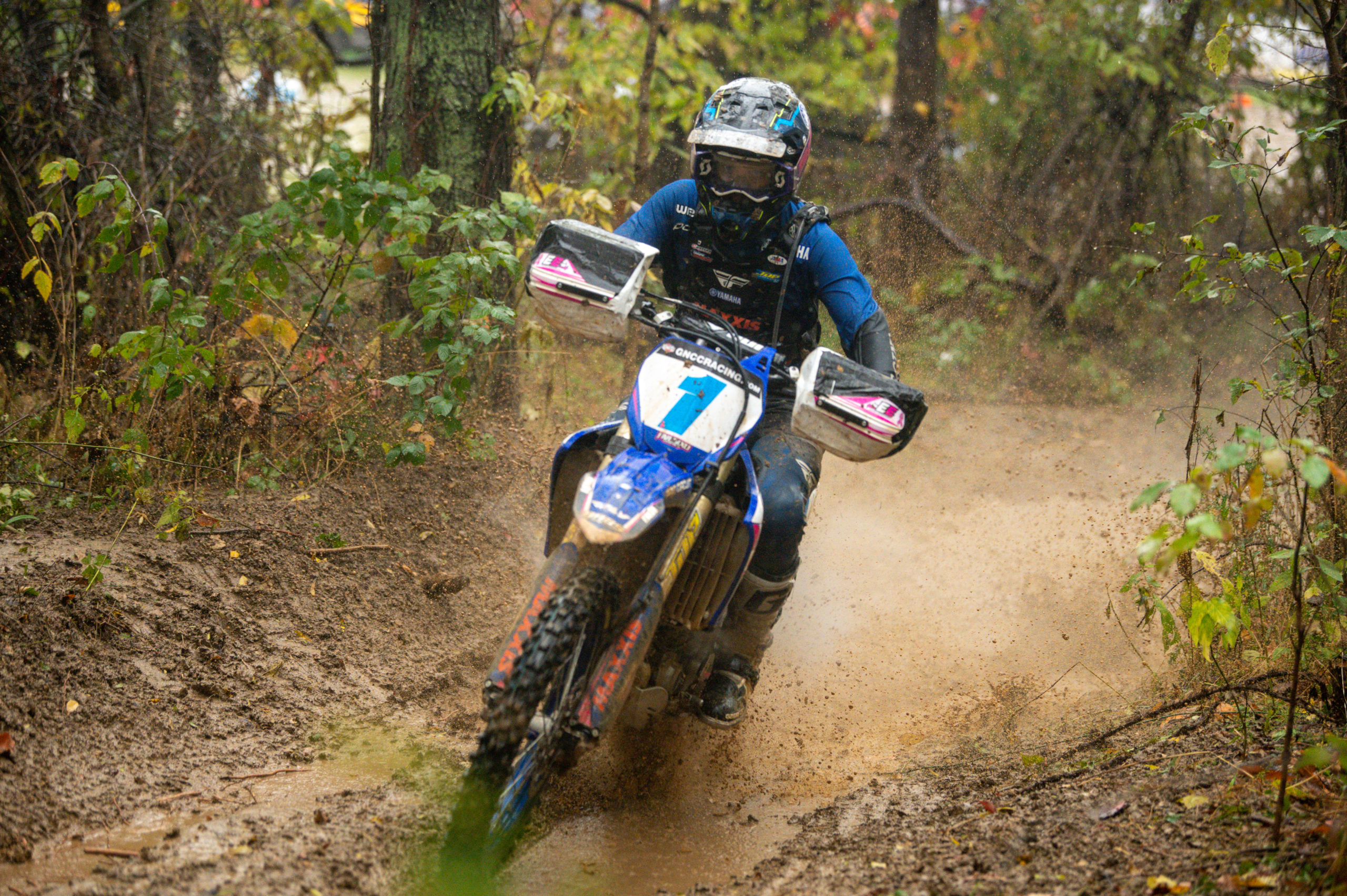 Becca Sheets riding through the mud of Ironman MX in Indiana.