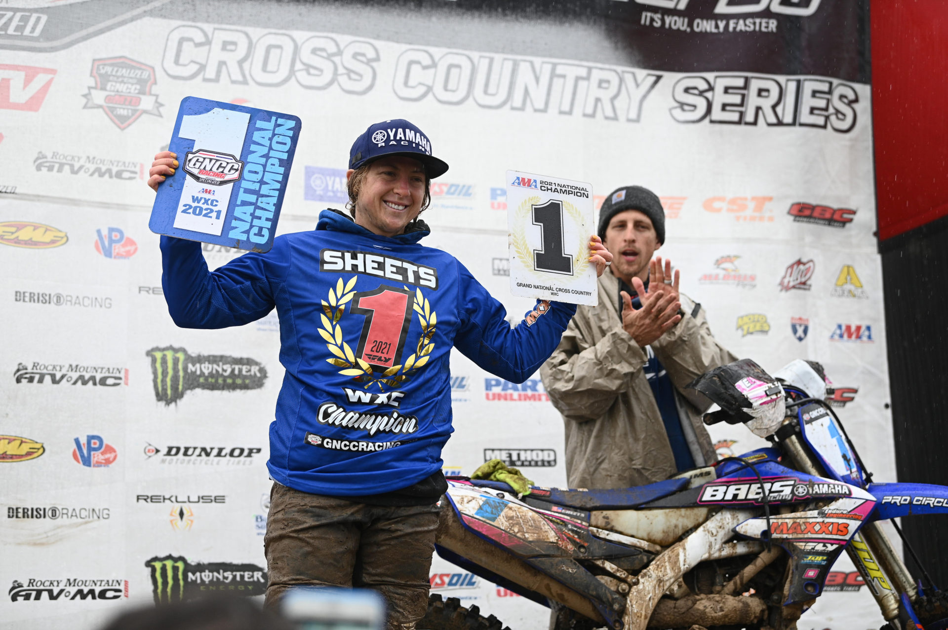 Becca Sheets holding the number one plate for the WXC GNCC series.