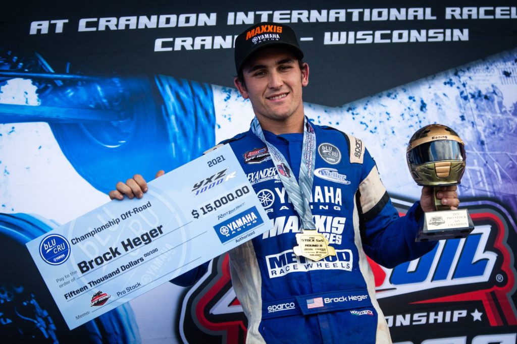 Brock Heger showing off his podium check