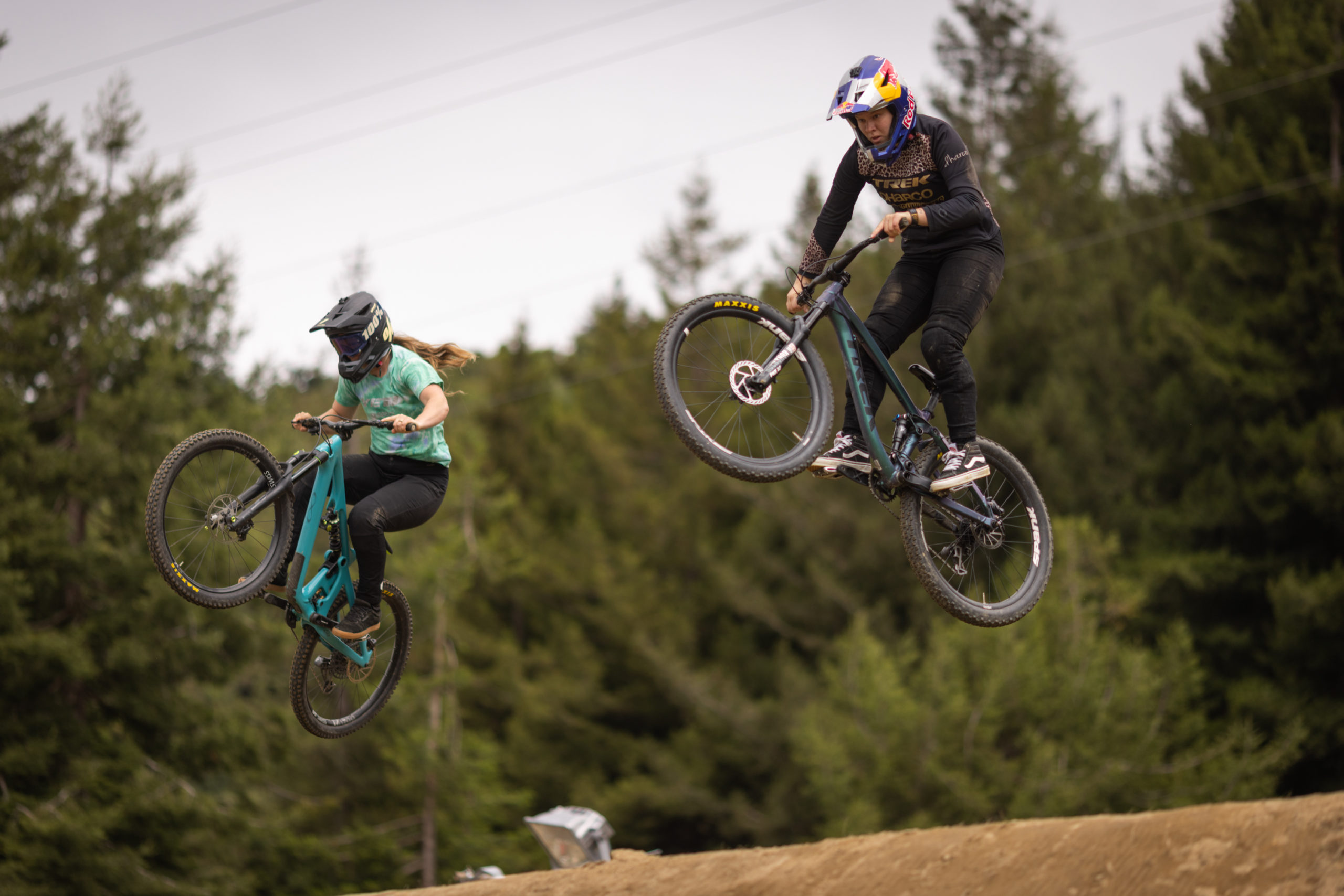 Two riders jumping during the speed & style competition