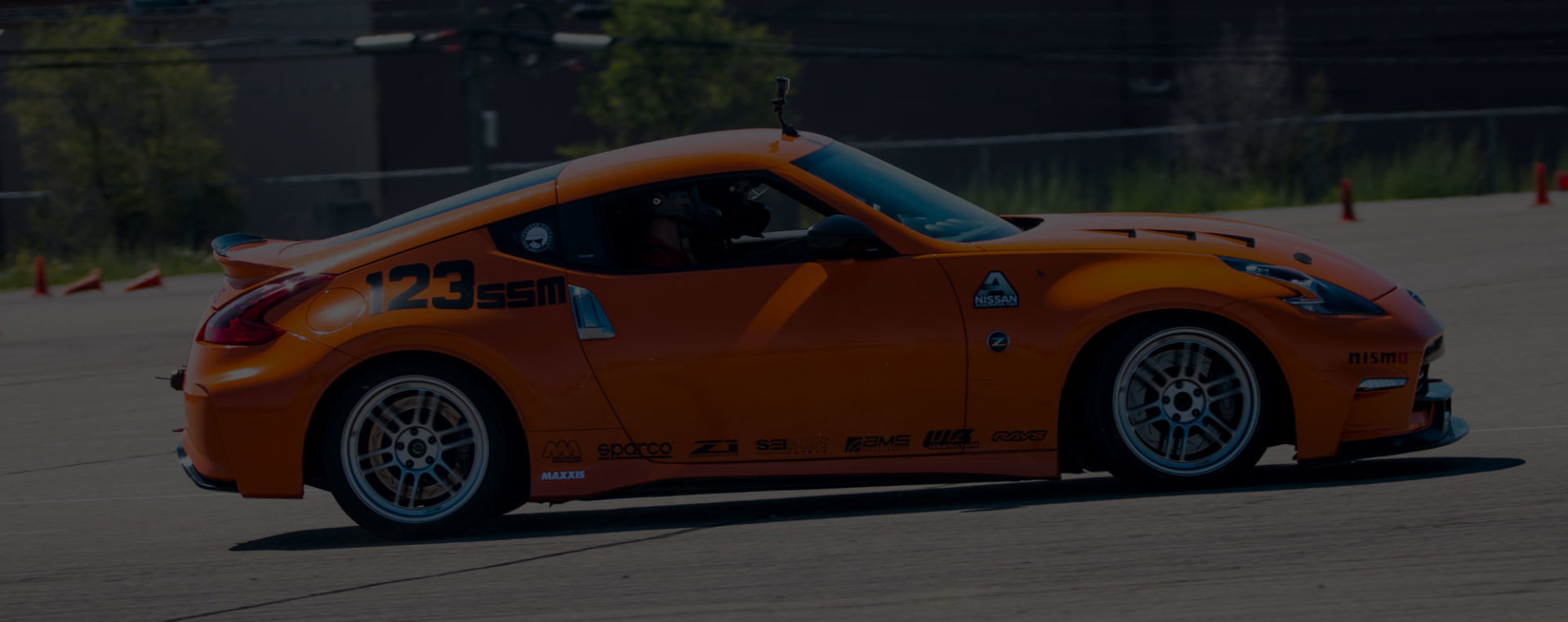 Orange Nissan Z racing autocross