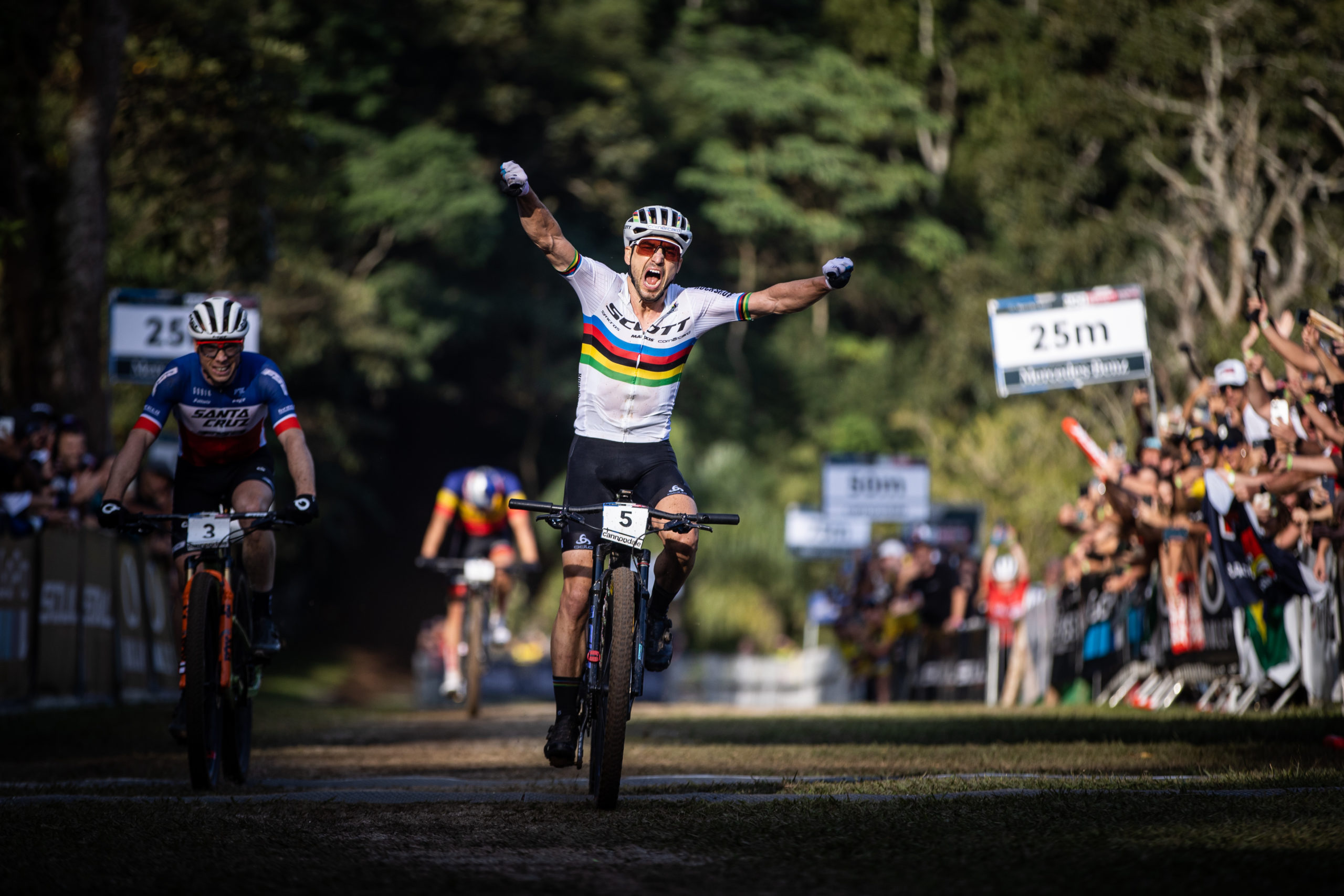 Nino riding to the finish, celebrating, in Brazil