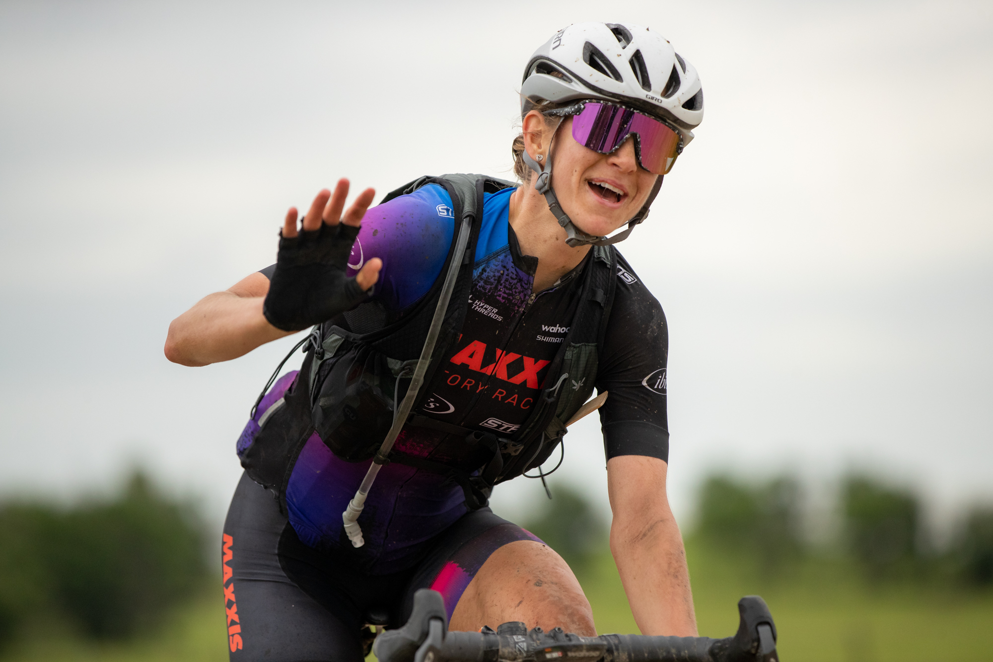Haley Smith waving at the camera during the Unbound race