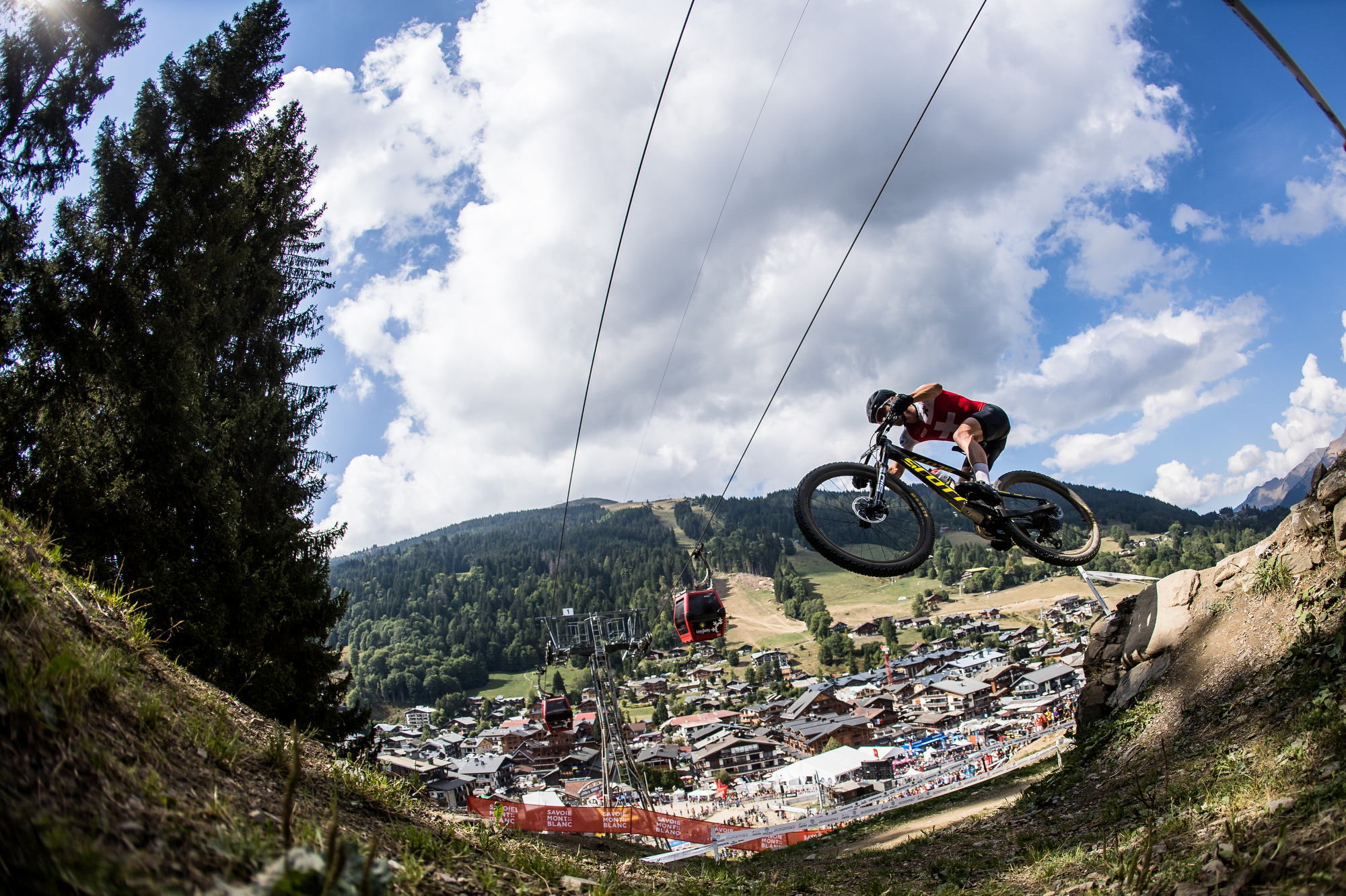 Nino hitting a jump on the XCO course