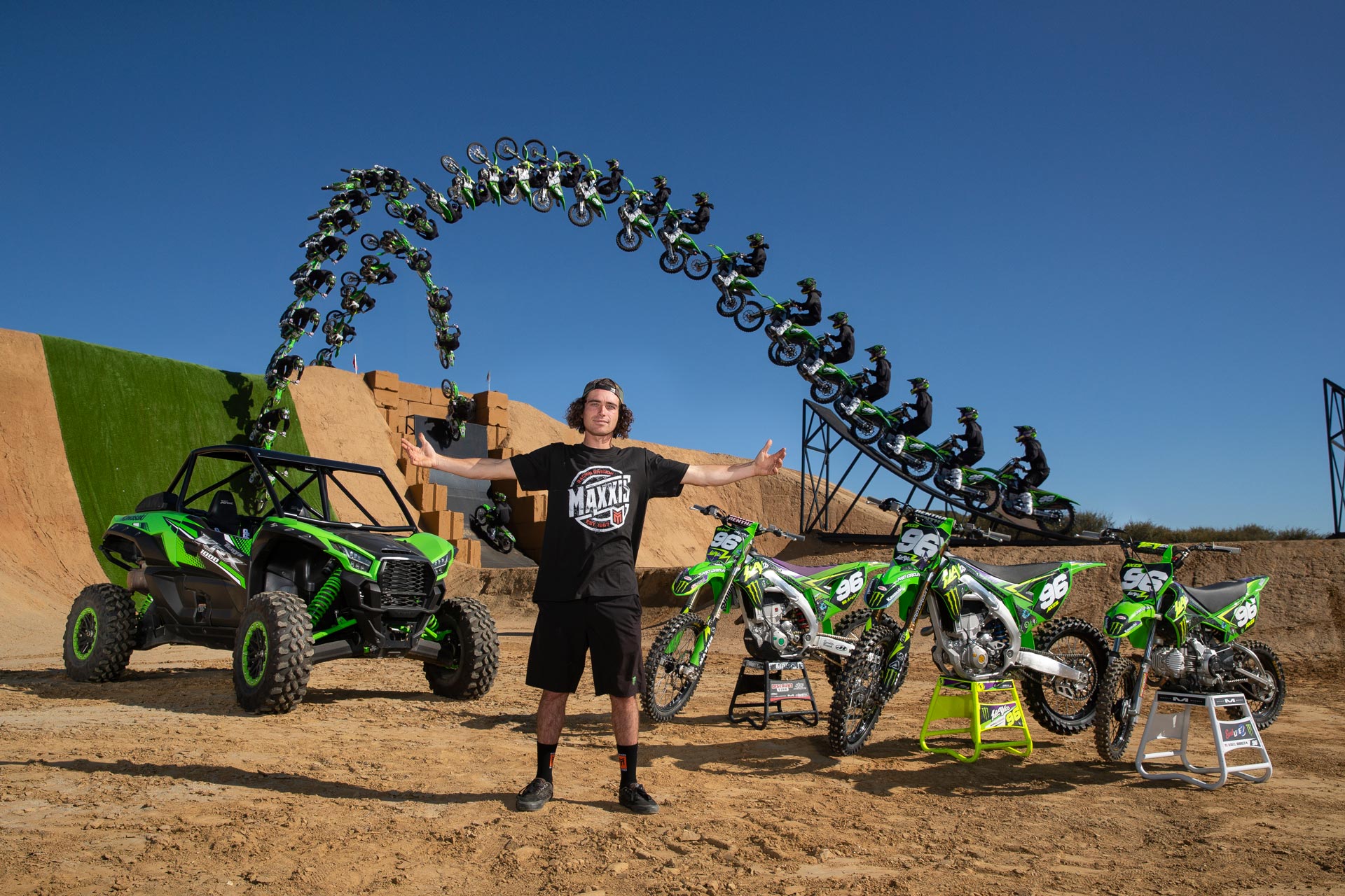 Multi-frame action sequence image of Axell Hodges ramp jumping on his Kawasaki KX250 riding Maxxcross MX-ST tires