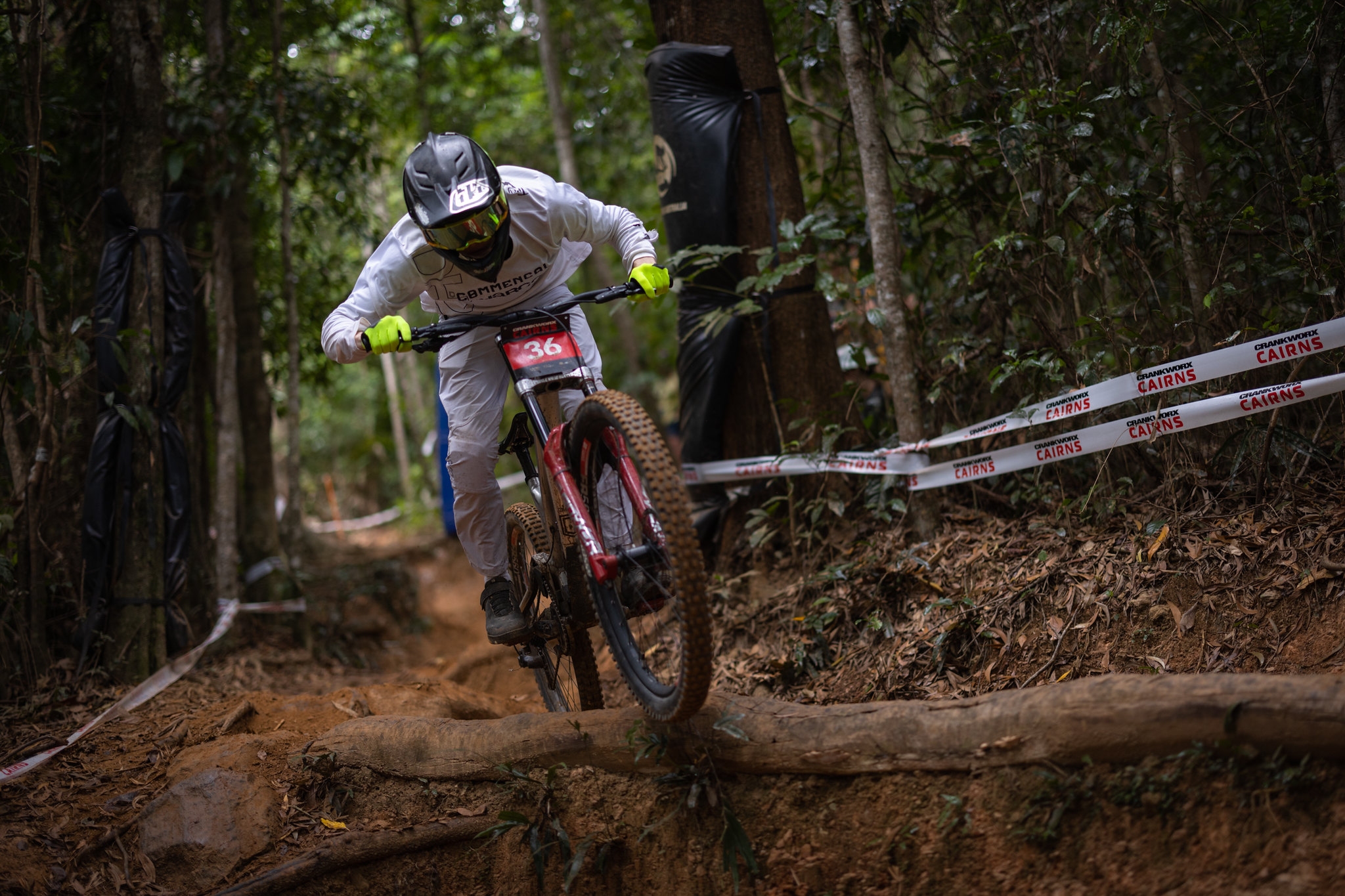 A Maxxis rider navigating a technical section in Cairns