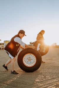 Person rolling a tire