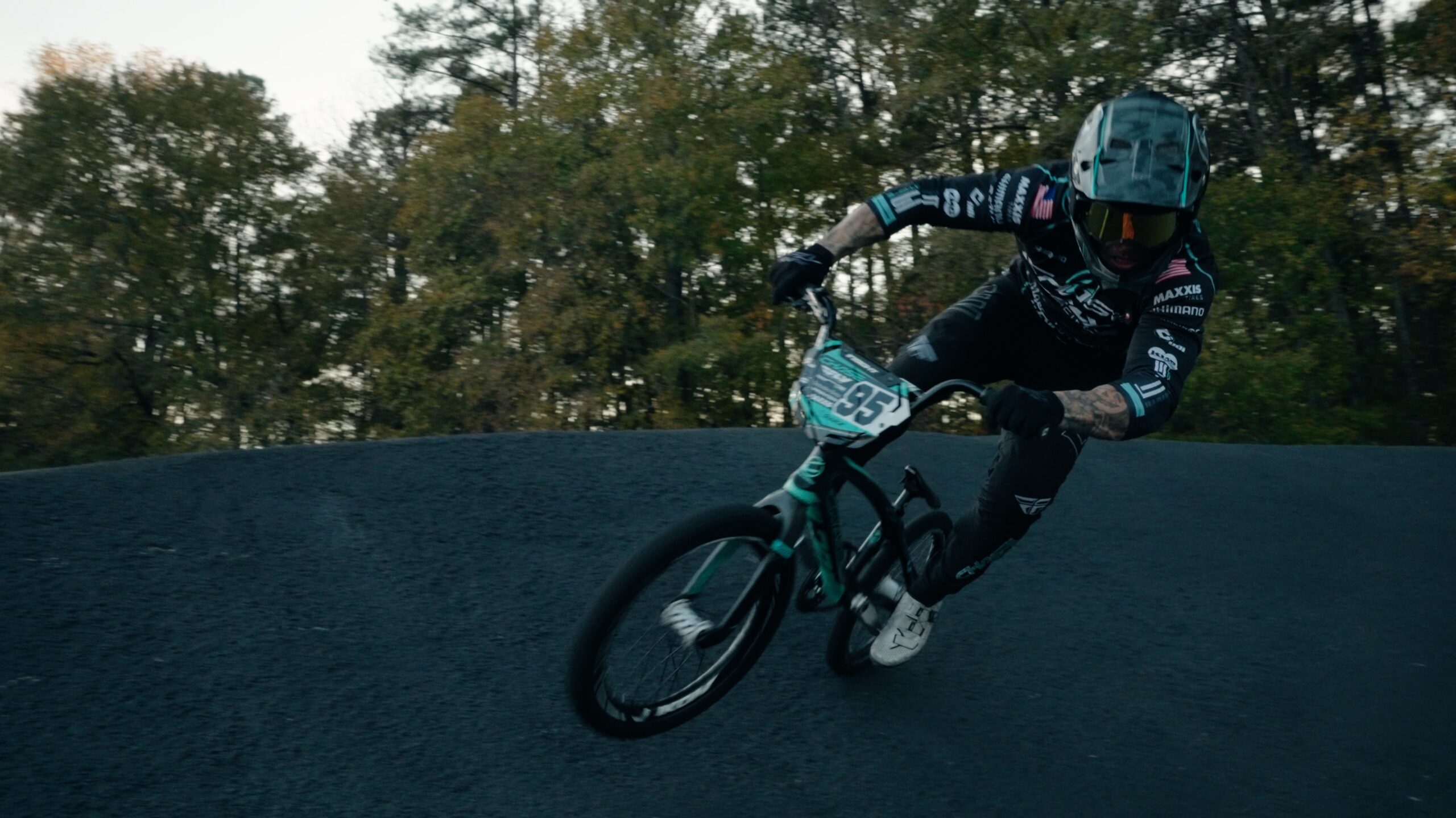 Barry Nobles rounding a corner on his bike