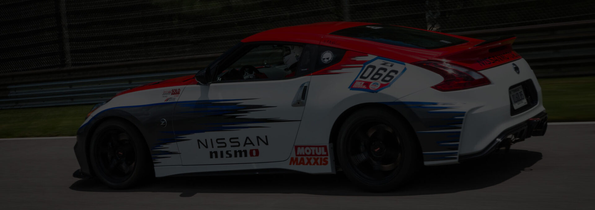 Darkened image of Nissan car.