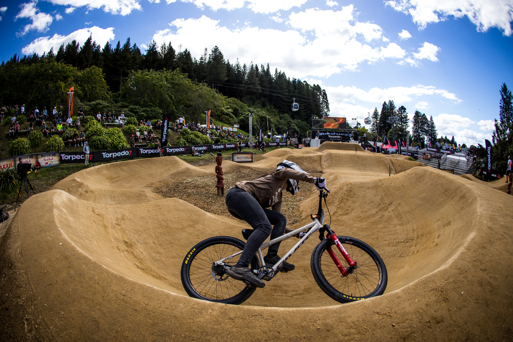 Kialani rounding a pump track corner