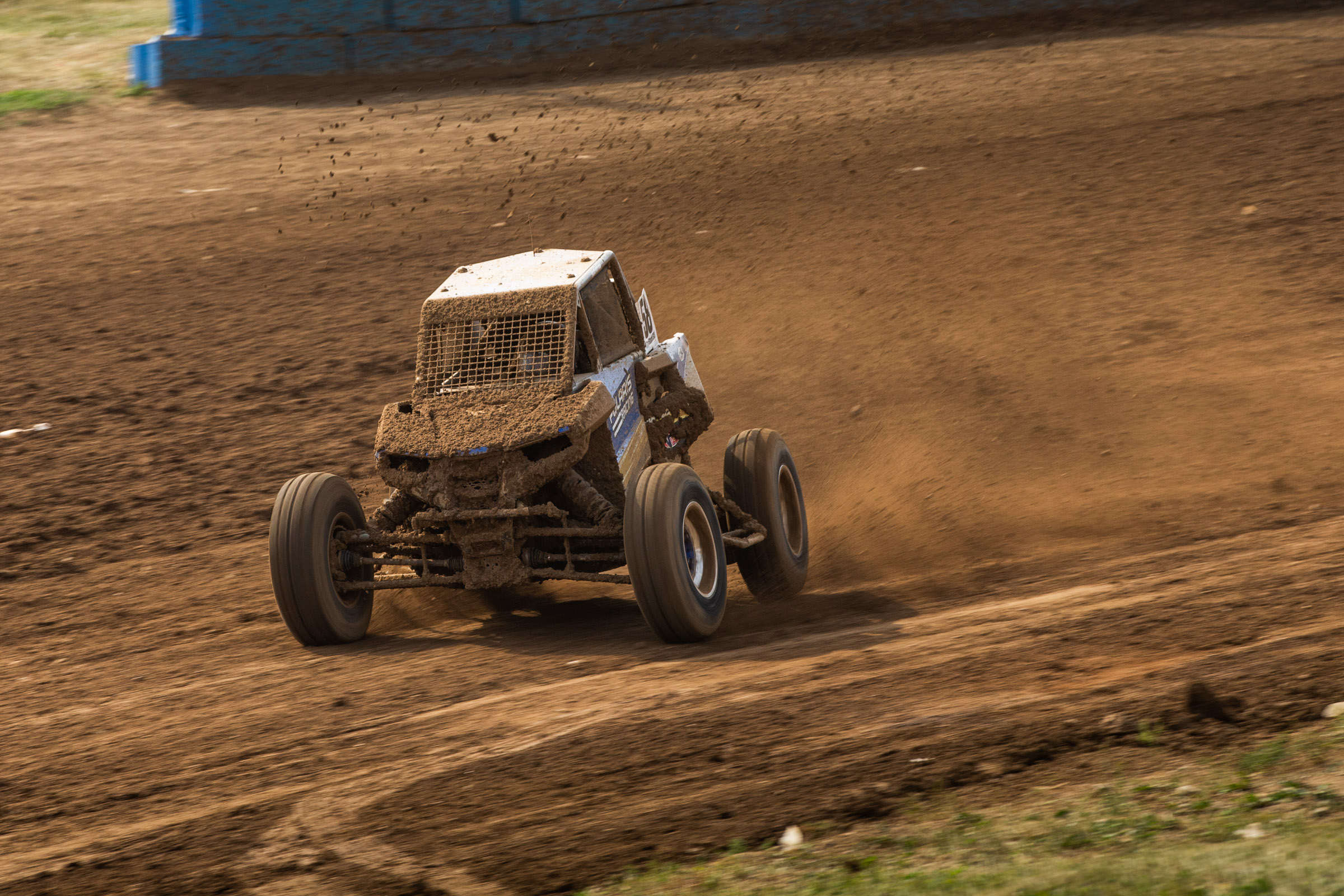 SxS racing on a dirt track.