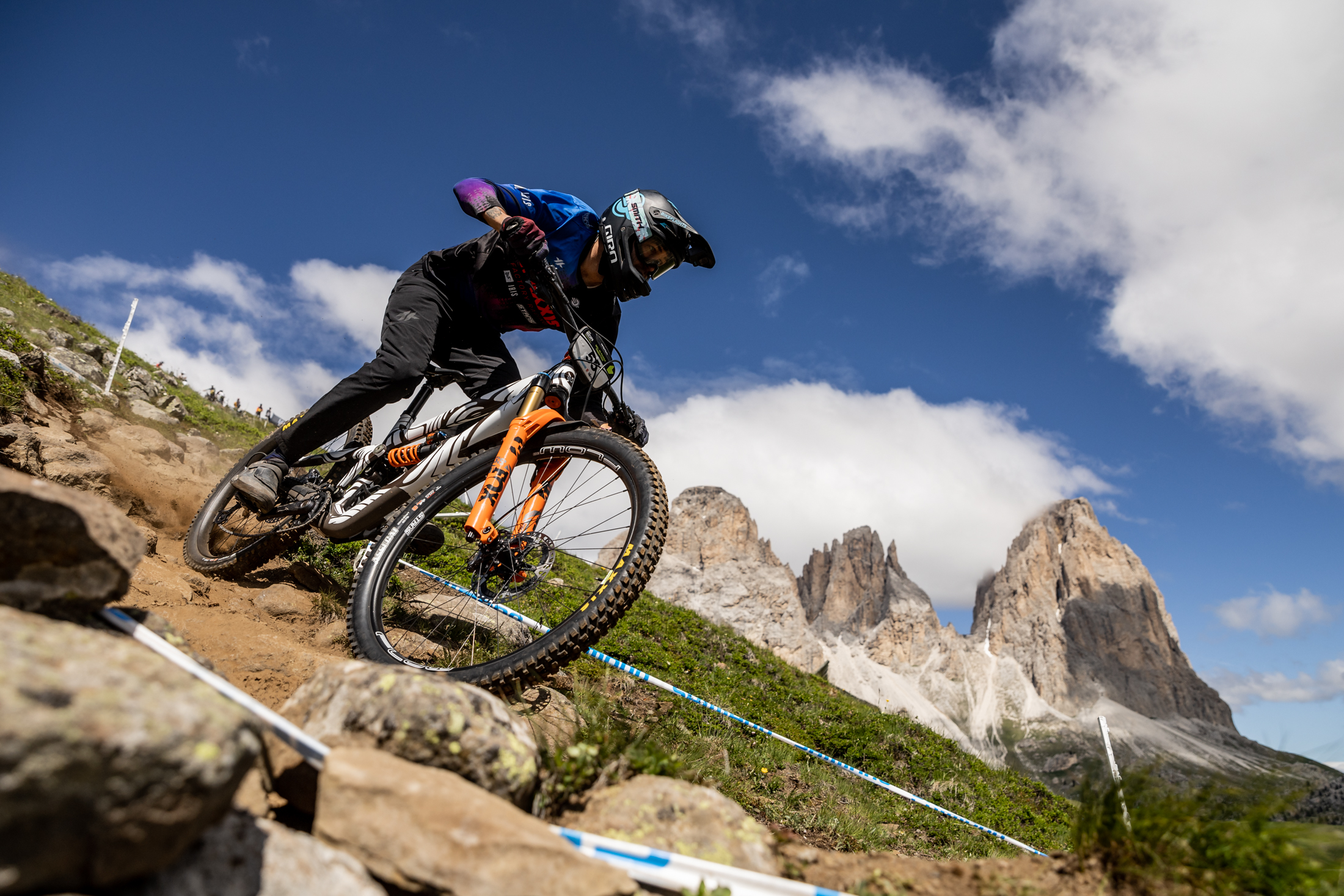 Colton riding down a technical trail section